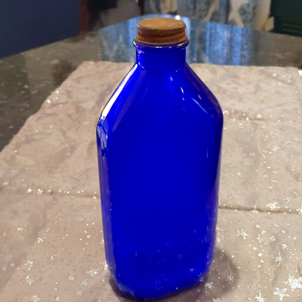 Vintage cobalt blue milk of magnesia bottle
